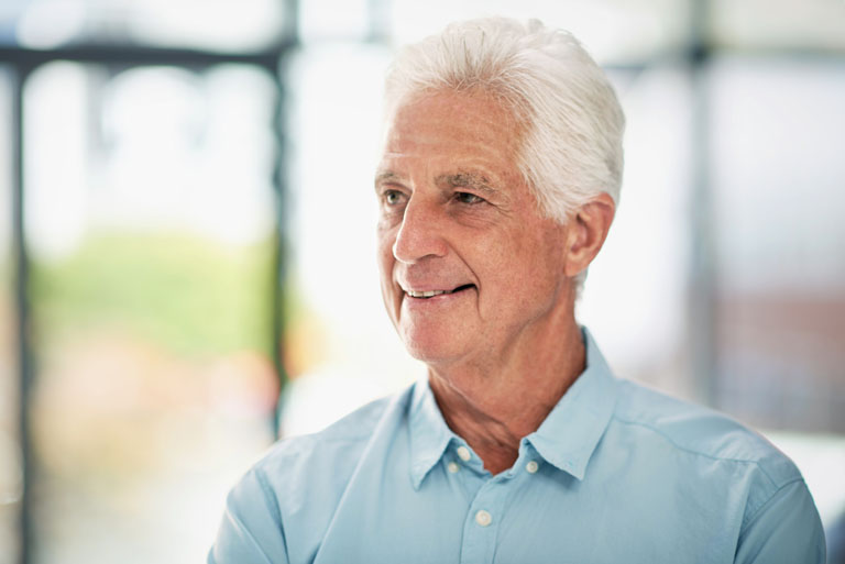 Smiling male patient in his 80s