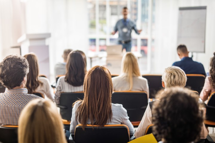 Speaker speaking at a conference